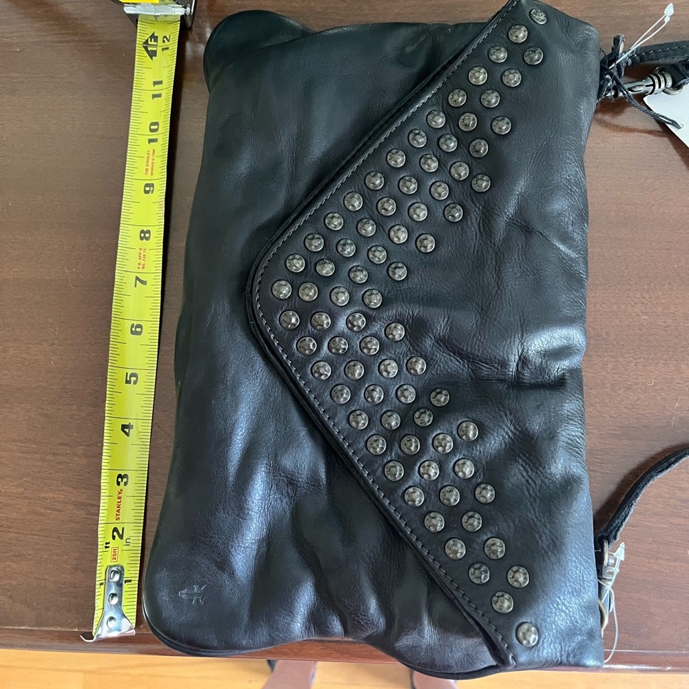 Frye black leather grommeted handbag